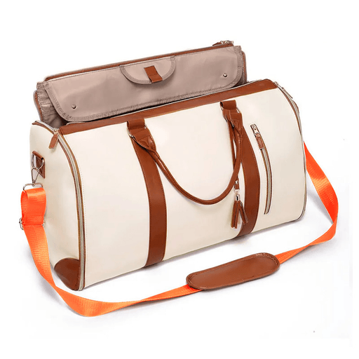 El bolso de viaje convertible de cuero PU con varios compartimientos es el accesorio ideal para llevar tus pertenencias de forma organizada y segura. Sus asas resistentes garantizan una mayor durabilidad, mientras que su diseño multifuncional te permite utilizarlo de diversas formas para adaptarse a tus necesidades. Además, su cierre de metal le da un toque de elegancia y seguridad extra. Gracias a que posee una correa ajustable, podrás llevarlo cómodamente colgado en el hombro.