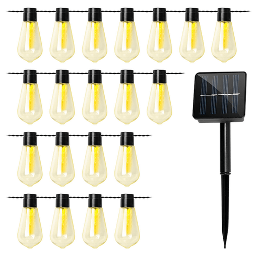Iluminá tus espacios con esta tira de luces LED retro de 5 metros, que incluye 20 lámparas de luz cálida ideales para uso interior y exterior. Con un panel solar y una autonomía de 6 a 7 horas, es perfecta para decorar pérgolas, patios, barbacoas, salas o eventos sin necesidad de cables. Cada lámpara tiene una vida útil de hasta 10000 horas y su diseño resistente al agua (IP65) garantiza durabilidad en todo tipo de clima. Se instala fácilmente e incluye panel solar, pincho de plástico y soporte de montaje.