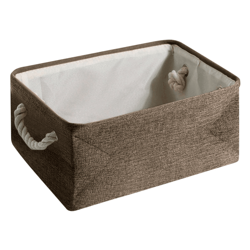 Esta caja organizadora de tela con asas es una opción práctica y elegante para mantener el orden en tu hogar. Su diseño está compuesto por una capa exterior de tela de mezcla de algodón y lino que le ofrece una durabilidad excepcional. Las asas laterales de cuerda de algodón permiten un fácil transporte, mientras que el marco de metal asegura que la caja mantenga su forma y resistencia. Gracias a su tamaño y resistencia, es perfecta para organizar una amplia variedad de artículos: desde suministros de arte y manualidades hasta ropa, ropa de cama, decoraciones y otros accesorios del hogar.