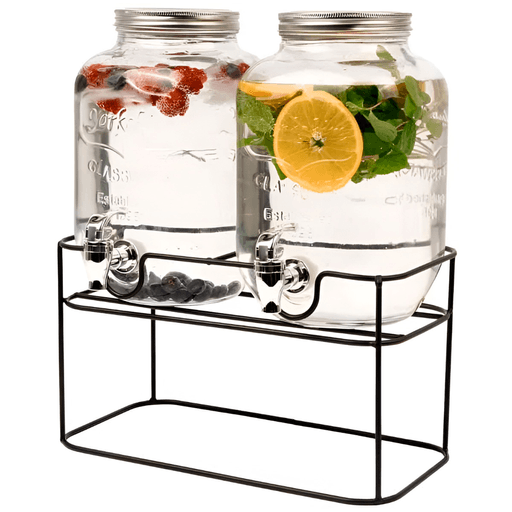 Con este set de 2 dispensadores de vidrio con base de metal, tus reuniones se llenan de estilo y frescura. Cada frasco tiene una capacidad de 4 litros, ideal para servir jugos, aguas saborizadas o limonadas bien frías. Su diseño moderno y elegante se combina con materiales de alta calidad, pensados para durar y lucir bien en cualquier ocasión. Fáciles de usar y de limpiar, son el complemento perfecto para tu mesa o barra. ¡Un detalle que hace la diferencia!
