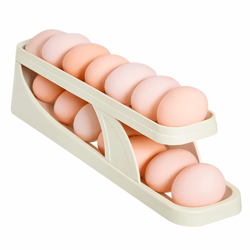 Organizá y conservá los huevos de forma práctica con esta huevera dispensadora con capacidad para 14 unidades. Su diseño de dos niveles con sistema rodante permite que los huevos se deslicen suavemente hacia adelante, facilitando el acceso y manteniendo siempre visibles los que están listos para usar. Fabricada en plástico resistente y duradero, puede utilizarse tanto dentro del refrigerador como sobre la mesada, ayudando a optimizar el espacio y mantener la cocina ordenada. Su estructura compacta y funcional es ideal para almacenar, organizar y preservar la frescura de los huevos, convirtiéndola en una solución práctica y elegante para el día a día en la cocina.