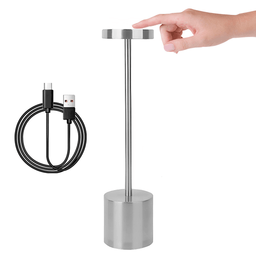 Esta Lámpara LED inalámbrica presenta un diseño innovador sin pantalla, proporciona una iluminación de 360º, uniforme y sin sombras ni parpadeos. Su base antideslizante, fabricada con material resistente al desgaste, garantiza estabilidad en cualquier superficie. Perfecta para diversas ocasiones, su luz cálida la convierte en la opción ideal para el dormitorio, mientras que su diseño versátil y fácil de ubicar la hace ideal como lámpara de escritorio o para crear un ambiente lujoso en restaurantes. Además, cuenta con 3 temperaturas de luz regulables, 4 niveles de brillo y una batería recargable de 3000mAh para mayor comodidad.