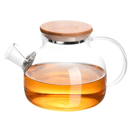 Esta tetera de vidrio con capacidad de 1L combina diseño elegante y funcionalidad en una sola pieza. Fabricada en vidrio de borosilicato de alta calidad, ofrece una excelente resistencia térmica, soportando temperaturas de -20°C a 150°C, lo que la hace ideal tanto para bebidas frías como calientes. Su boca ancha facilita la limpieza, y al ser apta para lavavajillas, brinda mayor practicidad en el uso diario. Incorpora un infusor extraíble de acero inoxidable, perfecto para preparar té en hebras, infusiones de frutas o hierbas sin residuos en la taza. Además, su tapa con detalles en bambú aporta un toque sofisticado, mientras que el mango ergonómico y el cierre hermético garantizan un vertido cómodo, seguro y sin derrames.