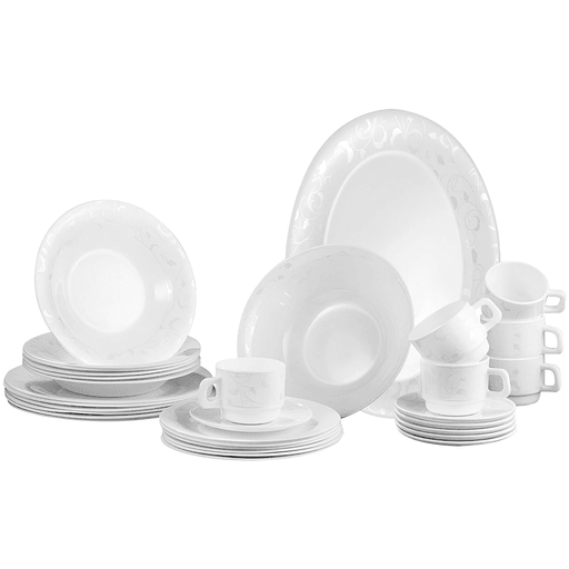 Descubrí este elegante set de vajilla de 38 piezas fabricado en vidrio opalino templado, un material resistente, liviano y fácil de limpiar. Su diseño blanco con delicados relieves florales le da un toque sofisticado a tu mesa, combinando perfectamente con cualquier estilo. Es apto para microondas, lavavajillas y heladera, lo que lo convierte en una opción práctica para el día a día sin perder distinción. Incluye platos, bowls y tazas con platillos, cubriendo todas tus necesidades con funcionalidad y estilo. Ideal para quienes buscan calidad y estética en cada comida.