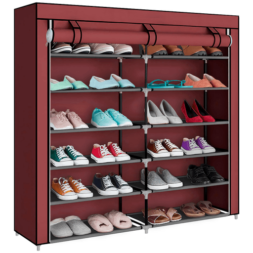 Práctica zapatera DecoTeam de tela plegable con 2 divisiones y 6 estantes. Realizada en tela transpirable de excelente calidad, plástico y metal. Posee cortinas enrollables con velcro y bolsillo en el lateral. Ideal para mantener tus zapatos u otros objetos ordenados y sin ocupar mucho espacio. Además es muy fácil de armar y limpiar.